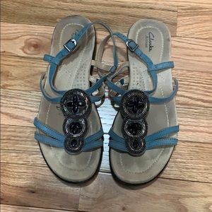 Clark's sandals with black bead work, size 8.5